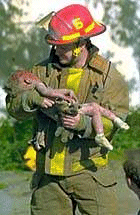 Photo from Oklahoma City bombing showing firefighter holding a lifeless baby